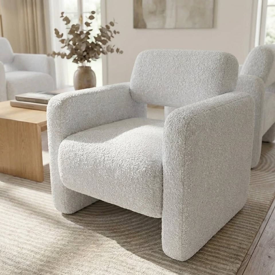 Bouclé armchair front view
