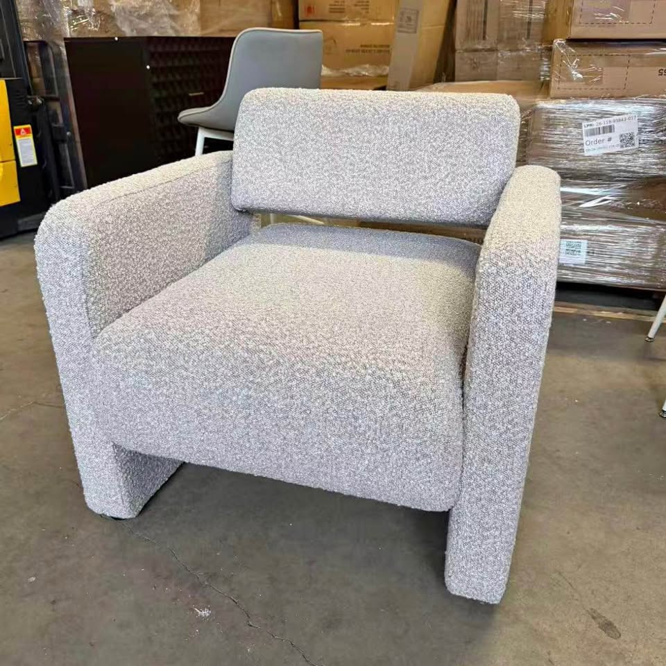 Bouclé armchair in room setting